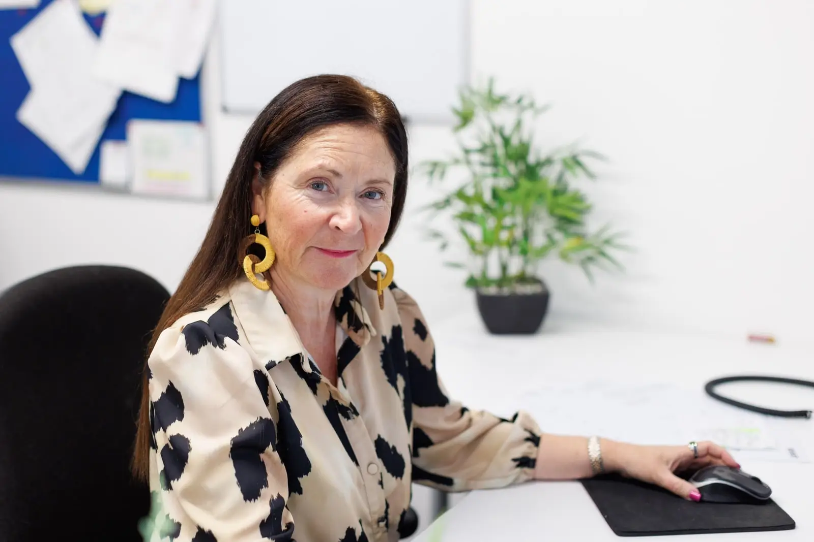 Karen, founder of Dandy Candy Events, at her desk